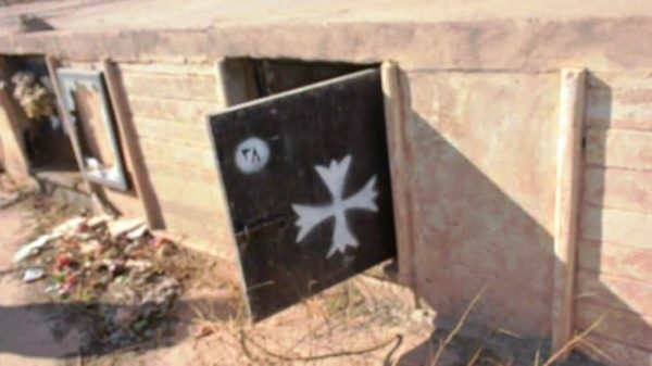 ISIS Breaks into Christian Coffins, Desecrates Corpses andCrosses